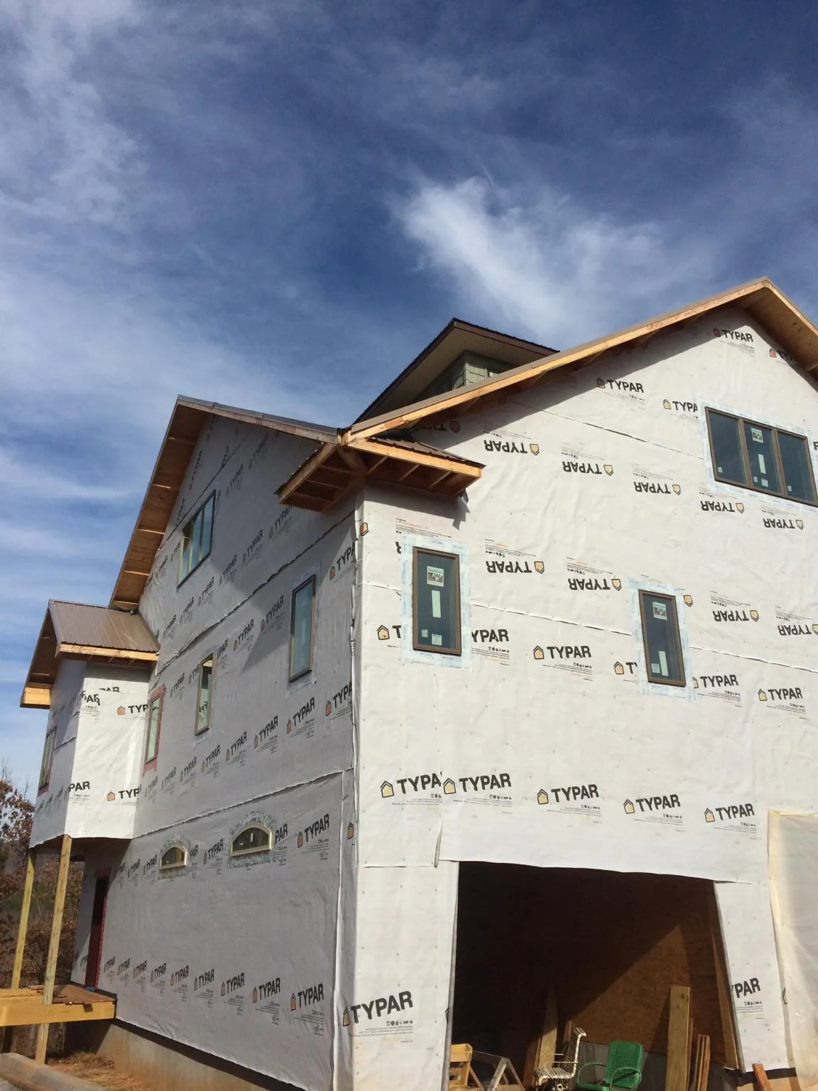 Stick built house wrapped in Typar with new roof framing and dormers in Winterville